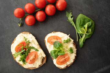 egg cheese ham dip, spread on open finger food sandwich with salad, tomato vegetables 