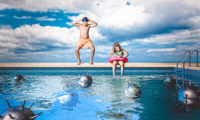 children ready to swim in the pool frightened by mines in the water.