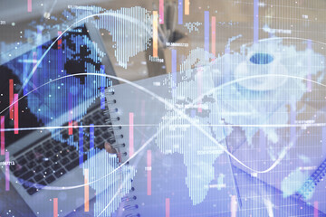 Multi exposure of woman hands typing on computer and business theme hologram drawing. Success concept.