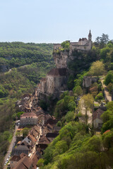 Fototapeta na wymiar Natural view of a Rocamadour medieval town in France against a clear blue sky background