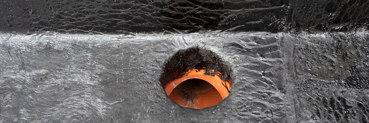 rainwater drain. Flat roof drain close up