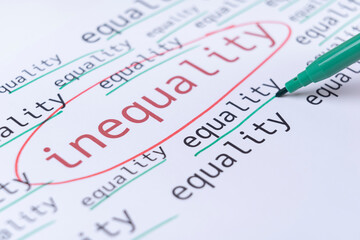 Obraz premium Gender equality concept, hand underlines with green marker the word EQUALITY. Selective focus