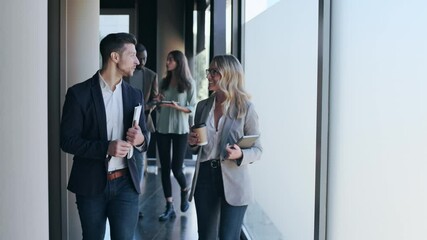 Group of entrepreneurs leaving office after successful negotiations