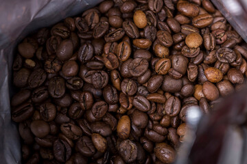 Packing with beans of coffee.