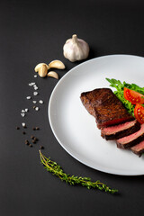 Grilled steak with vegetables