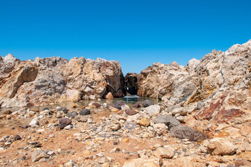 Landscape of beautiful bay with rocky beach in Kos island, Greece