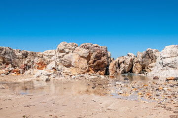 Fototapeta na wymiar Landscape of beautiful bay with rocky beach in Kos island, Greece