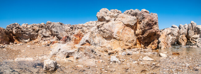 Landscape of beautiful bay with rocky beach in Kos island, Greece