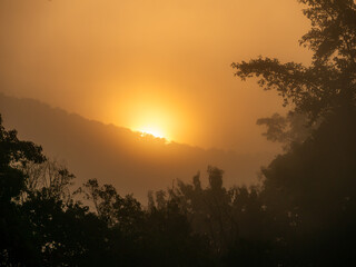 Sun is Shining Gold from The Edge of The Mountain