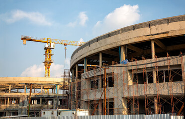 Construction site with crane against sky