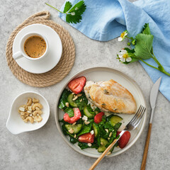 Fried Chicken Breast with Fresh Strawberry Cucumber Salad.