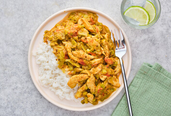 Rice with chicken and vegetables in a creamy sauce.