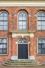 Fototapeta na wymiar Entrance to a historic building in Assen, Netherlands