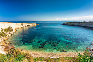 Beautiful cliffs of Malta at the Marsaxlokk village