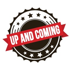 UP AND COMING text on red brown ribbon stamp.