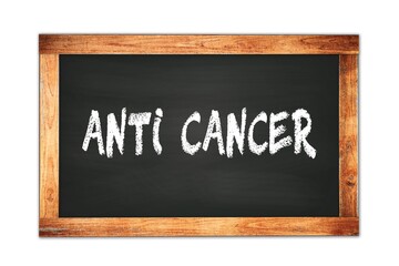 Obraz premium ANTI CANCER text written on wooden frame school blackboard.
