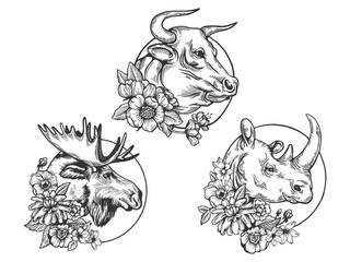 Bull Rhinoceros Moose heads animal set tattoo with flowers sketch engraving vector illustration. T-shirt apparel print design. Scratch board imitation. Black and white hand drawn image.