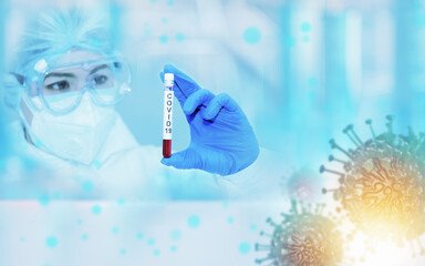 Obraz na płótnie Canvas Female scientist hands holding coronavirus covid 19 infected blood sample in test tube in laboratory with biohazard protection clothing in coronavirus covid 19,covid-19 symbol foreground.