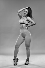 Fototapeta premium Curvy woman doing fitness exercises