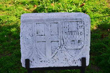 Cross and castle symbols on White marble, Castle and cross engraved on White stone.