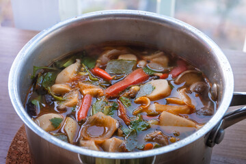 vegan food - tom yum mushroom in pot