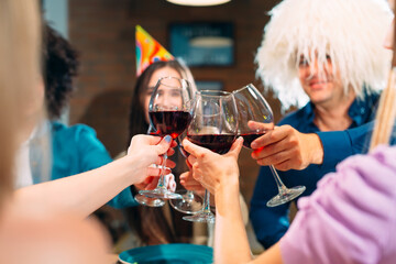 Party at a restaurant. Friends have fun in a restaurant and drink wine. festive mood.
