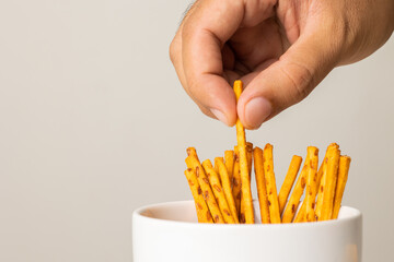 Crispy Pretzel Sticks salty. Snacks Fast food or junk food snacks unhealthy concept.