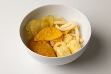 Many Crispy Snacks food potato chip salty. Fast food or junk food snacks unhealthy concept.
