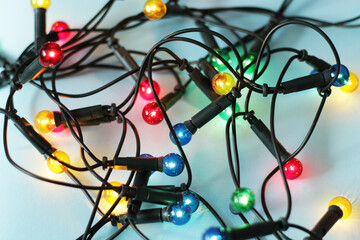 colourful christmas lights on blue background