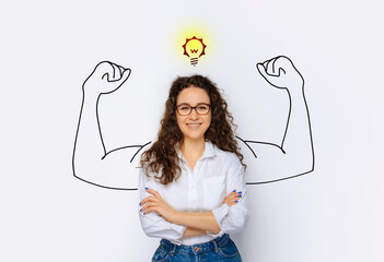 Happy young business woman posing isolated shows muscle