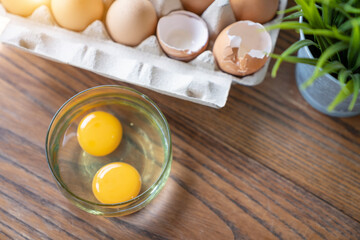 prepare cooking with brown organic egg