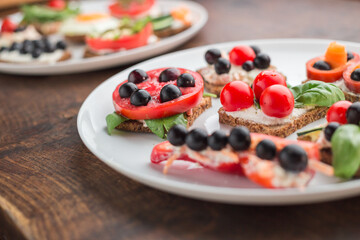 Freesh vegetarian sandwiches on a white plate