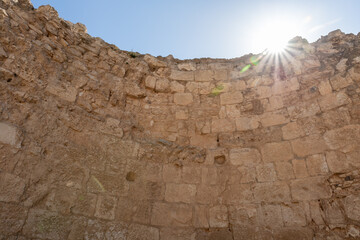 Remains of the  inner wall in the courtyard of the ruins of the palace of King Herod - Herodion in the Judean Desert, in Israel