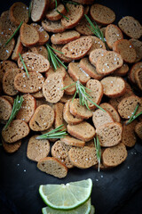 Rye croutons with rosemary and spices. Healthy snack. Homemade croutons. Beer snack.