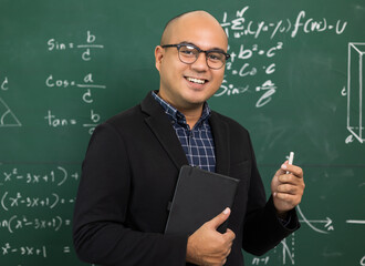 Young asian teacher man teaching video conference with student. Male Indian teacher training the...