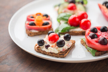Freesh vegetarian sandwiches on a white plate