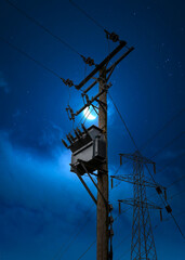 Electric power pylon cables at night blue hour moon sky shining. High voltage electricity...