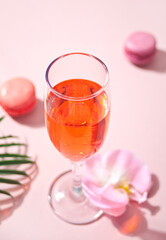 Summer tropical pink cocktail decorated pink orchid flowers.