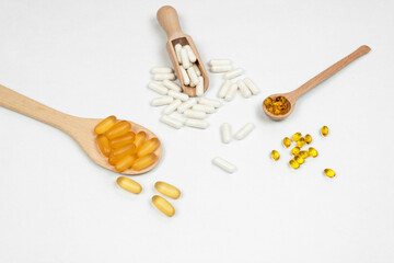 capsules and pills with a vitamin complex and fish oil 