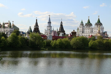 view of the Izmailovsky kremlin across the lake moscow Russia summer