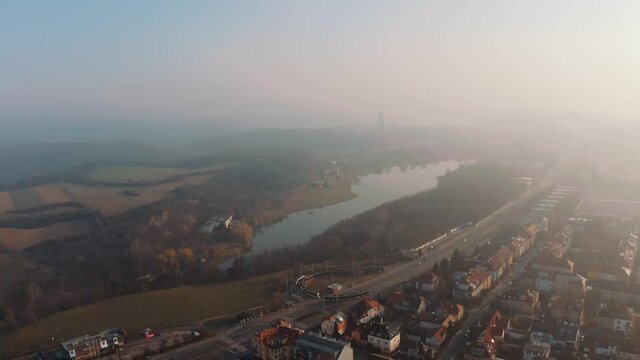Amazing aerial drone view of Prague Sarka lysolaje national park Czechia, misty early morning day, circle pan