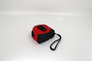 Red tape measure used in construction sites