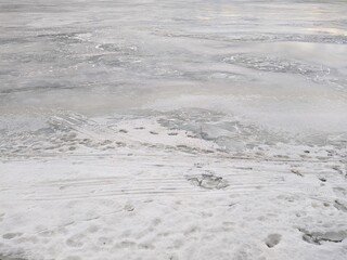 frozen and ice covered river in the daytime