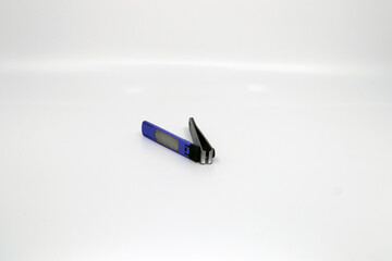 a long-used purple nail clipper