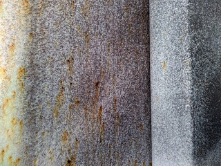 Colored rusty stained metal wall texture pattern