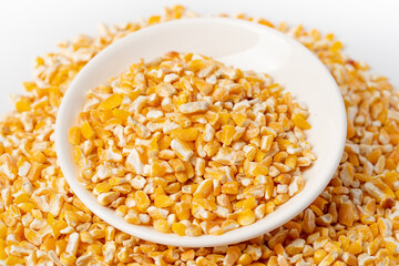 The characteristic dry grain of northeast rice ballast under pure white background
