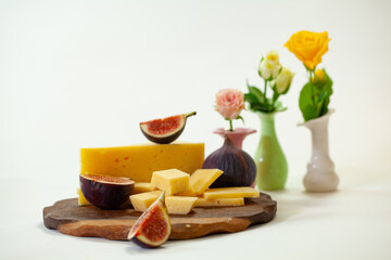 cheese plate, nuts, honey, figs