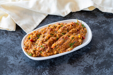 Spicy appetizer. Traditional Turkish and Arabic cuisine meze. Snack meal served alongside the main course. Natural vegetarian food. Local name yandım hacer