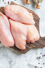 raw chicken breast skinless fillet piece of poultry snack healthy meal top view copy space for text...