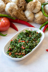 Tabboule appetizer. Traditional Turkish and Arabic cuisine meze. Snack meal served alongside the main course. Natural vegetarian food. Local name taboule mezze.